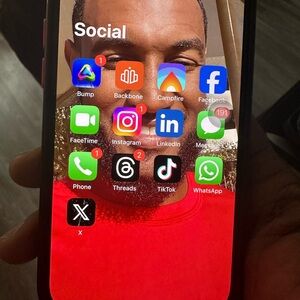 iPhone with Social Media Apps Display